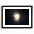 Abstract art print of geometric tunnels in black and white, framed with a black mat.