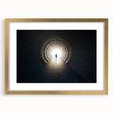 Extra large abstract art print featuring a colorful, textured design of architectural tunnels, framed in gold.