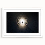 Textured abstract art print featuring interlocking tunnels in muted gray, framed in white, ideal for modern bedroom ambiance.