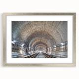 Textured abstract art print featuring curvilinear shapes in muted gray, framed in silver, ideal for bedroom art.