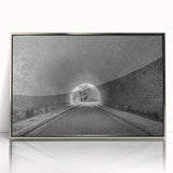 Mid-century modernist art of architectural tunnels in muted silver and gray hues on framed acrylic.