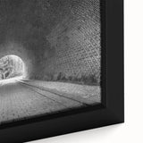 Extra large framed canvas featuring a close-up of a black textured tunnel design with colorful art accents.