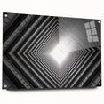 Large abstract wall art on acrylic glass depicting geometric tunnel designs in monochrome.