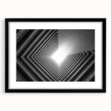 Extra large abstract art print featuring a colorful, textured tunnel design on a black framed canvas.