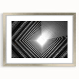 Textured art print featuring abstract tunnel designs in muted grey, framed in silver, ideal for modern bedroom decor.
