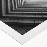 Art deco poster of geometric tunnels in muted beige tones on rolled canvas, suitable for dining room decor.