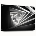 Large abstract wall art on acrylic glass depicting architectural tunnels in muted gray tones.