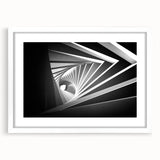 Abstract art prints of architectural tunnels in muted gray, framed in white, suitable for dining room decor.