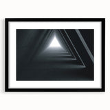 Abstract art print featuring a colorful, textured tunnel design on a large black-framed canvas.