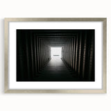 Textured abstract art print in muted gray and blue tones, framed with a silver mat, suitable for bedroom decor.