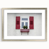 Abstract art print featuring geometric patterns in muted gray and blue tones, framed in silver, ideal for dining room decor.