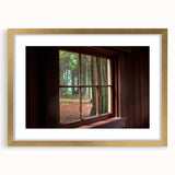 Textured abstract art print featuring layered circles in earth tones, framed in gold, ideal for bedroom art.