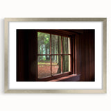 Abstract art print featuring geometric patterns in black and white, framed in silver.