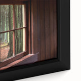 Close-up of black wall art featuring a textured window design in vibrant colors on a framed canvas.