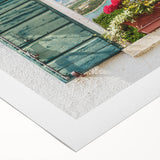 Art deco poster featuring geometric patterns and muted gold and navy tones on rolled canvas.