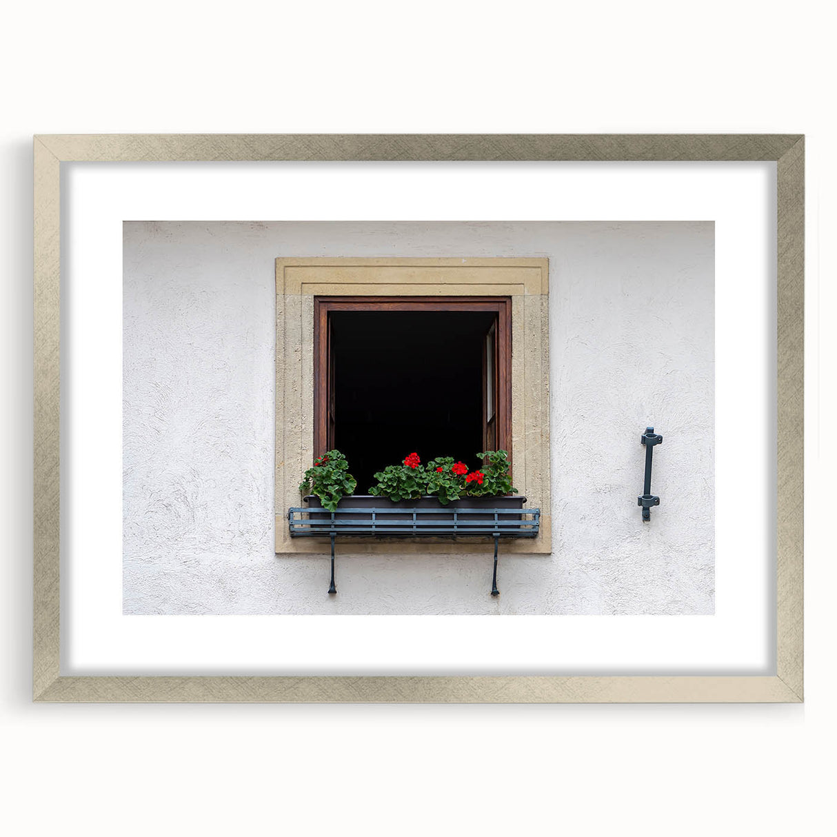 Abstract art print featuring geometric patterns in muted gray and blue tones, framed with a silver mat.