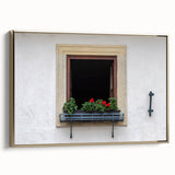 Framed canvas of a vintage landscape painting with colorful art and black accents, ideal for living room decor.