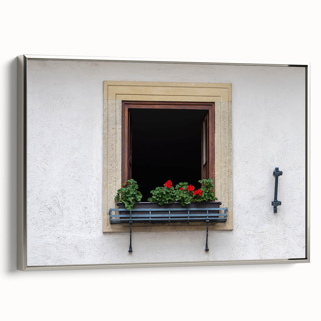 Vintage poster art of a colorful abstract design in a silver frame, ideal for living room decor.
