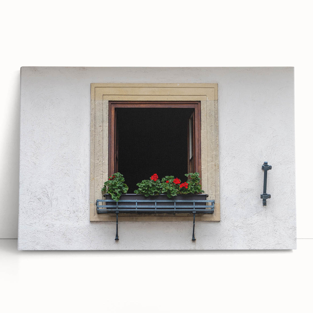 Large black and white photo of an architectural window design on stretched canvas.