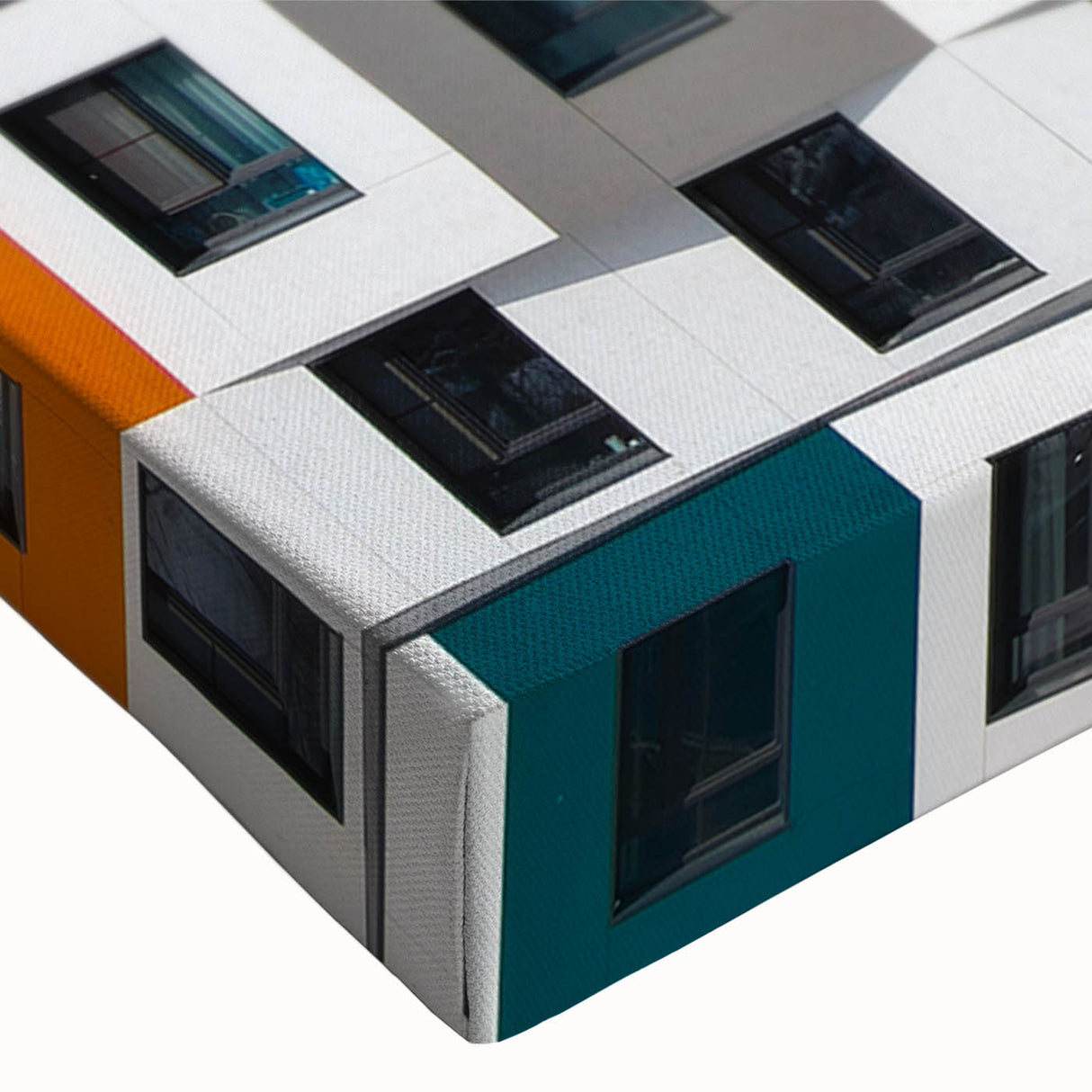 Close-up of a large art canvas featuring a black and white architectural window design, ideal for bedroom wall decor.