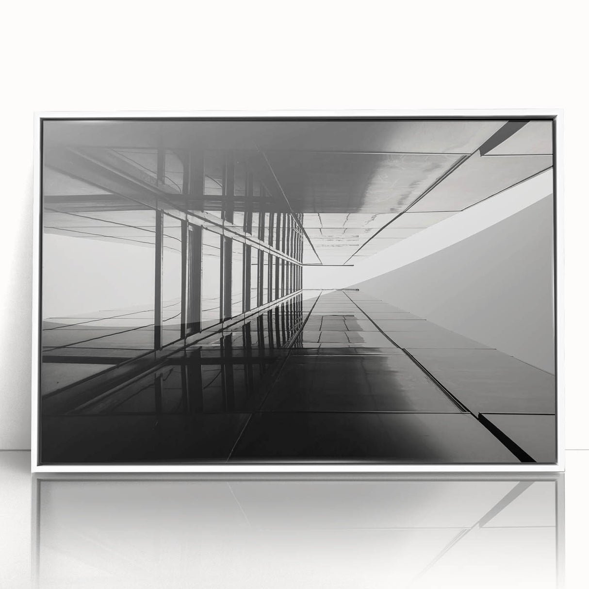 Large art print of a mid-century modernist architectural window design in muted gray and white tones on framed acrylic.