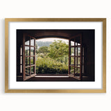 Textured abstract art print featuring geometric shapes in muted gold and white, framed in gold, ideal for bedroom decor.