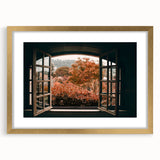 Textured abstract art print featuring geometric patterns in gold and white, framed with a matte finish.