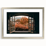 Abstract art print of geometric patterns in silver frame, featuring black and white tones, ideal for dining room decor.