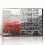 Mid-century modernist art featuring a geometric window design in gold and black on a framed acrylic.