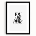Electric Wall Art: Bold Black Typography 'You Are Here' for Modern Spaces