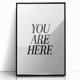 Electric Wall Art: Bold Black Typography 'You Are Here' for Modern Spaces