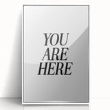 Electric Wall Art: Bold Black Typography 'You Are Here' for Modern Spaces