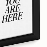 Electric Wall Art: Bold Black Typography 'You Are Here' for Modern Spaces