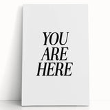 Electric Wall Art: Bold Black Typography 'You Are Here' for Modern Spaces