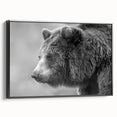 Framed wall art featuring a striking black bear design on canvas, showcasing detailed fur textures and vibrant colors, ideal for nature-themed decor.