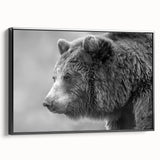 Framed wall art featuring a striking black bear design on canvas, showcasing detailed fur textures and vibrant colors, ideal for nature-themed decor.