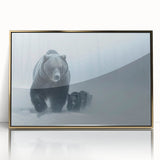 Framed wall art featuring a striking black bear design on acrylic, highlighted by a sleek gold frame, perfect for adding a touch of nature-inspired elegance to any room.