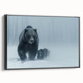 Framed canvas wall art featuring a striking black bear design, showcasing intricate details and a sleek black frame, perfect for nature-themed home decor.