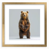 Black bear wall art print in a gold frame, showcasing intricate design details and a white mat, perfect for adding a touch of nature-inspired elegance to home decor.
