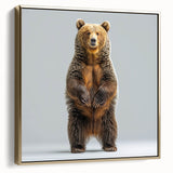 Framed canvas wall art showcasing a black bear design with a gold frame, highlighting its intricate details and elegant side view, perfect for wildlife decor enthusiasts.