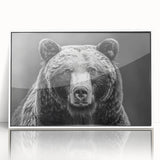 Framed wall art featuring a striking black bear design in a modern acrylic frame, displayed against a clean white backdrop, perfect for nature-themed decor.