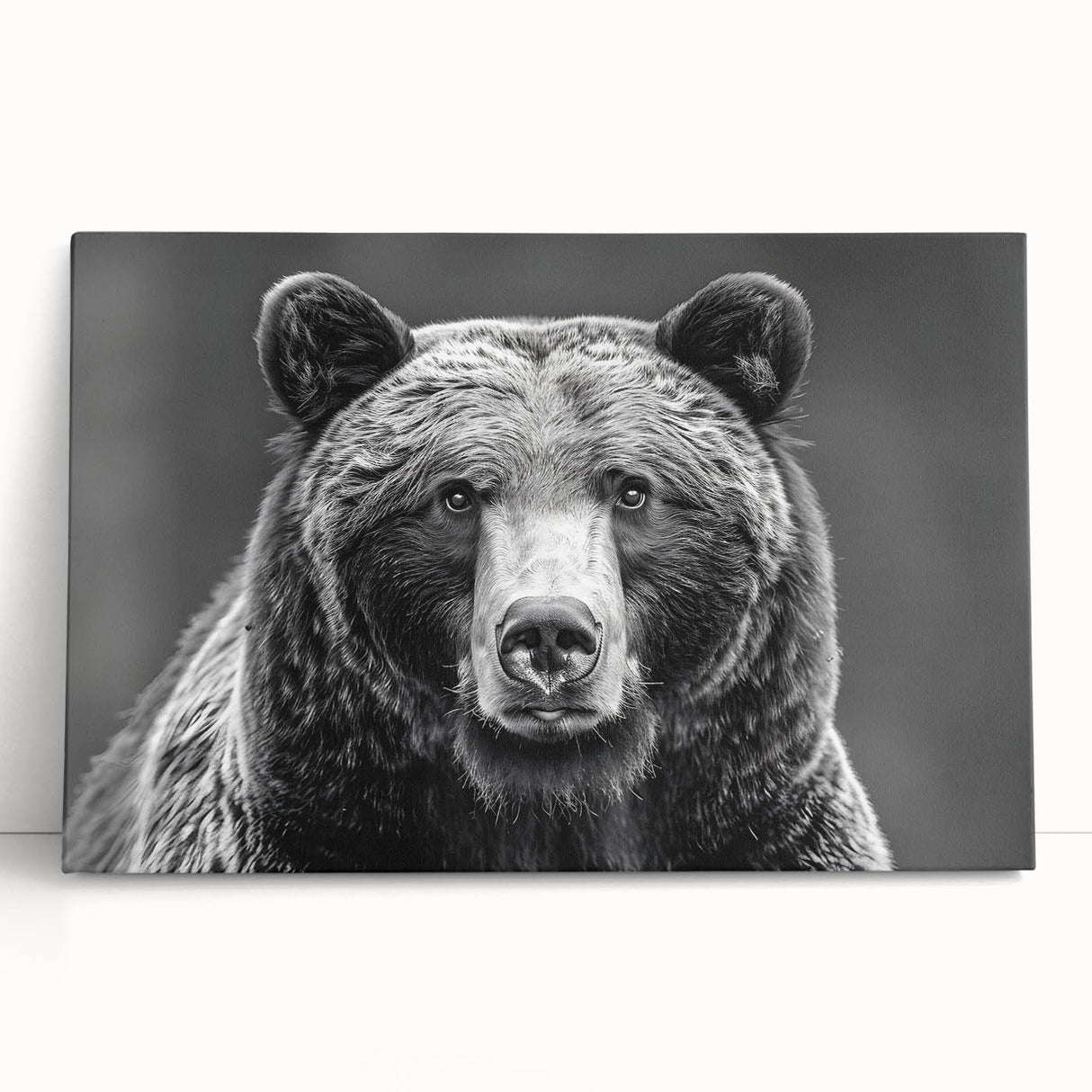Black bear wall art on stretched canvas, showcasing a striking design with rich textures and deep colors, perfect for nature-themed home decor.