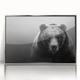 Framed wall art featuring a striking black bear design in a sleek silver frame, showcasing detailed artwork with vibrant colors, perfect for nature-themed decor.