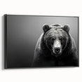 Framed canvas wall art featuring a striking black bear design, showcased in a sleek black frame. Ideal for wildlife enthusiasts, this piece adds nature-inspired elegance to home decor.