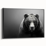 Framed canvas wall art featuring a striking black bear design, showcased in a sleek black frame. Ideal for wildlife enthusiasts, this piece adds nature-inspired elegance to home decor.