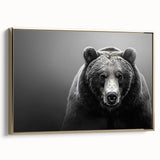 Framed wall art showcasing a stunning black bear design on a textured canvas, accented with a gold frame, ideal for nature-inspired home decor.