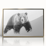 Framed wall art featuring a black bear design in a sleek acrylic frame with a gold border, perfect for adding a touch of nature-inspired elegance to home decor.