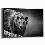 Framed canvas wall art showcasing a black bear design, positioned in a sleek black frame, ideal for wildlife enthusiasts and modern decor lovers.