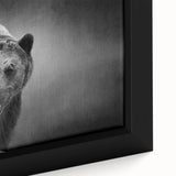 Close-up of a framed canvas wall art featuring a striking black bear design, showcasing intricate details and vibrant colors, perfect for nature-themed decor.