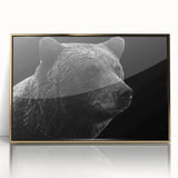 Framed wall art showcasing a striking black bear design with a gold acrylic front, perfect for nature-themed decor, enhancing any living space's aesthetic.